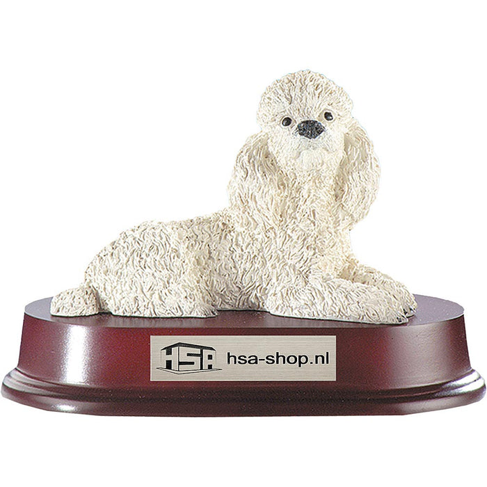 Trofee witte poedel op rode houten voet