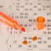 Bingostiften Magic Sketch oranje voorbeeld op gekleurd papier